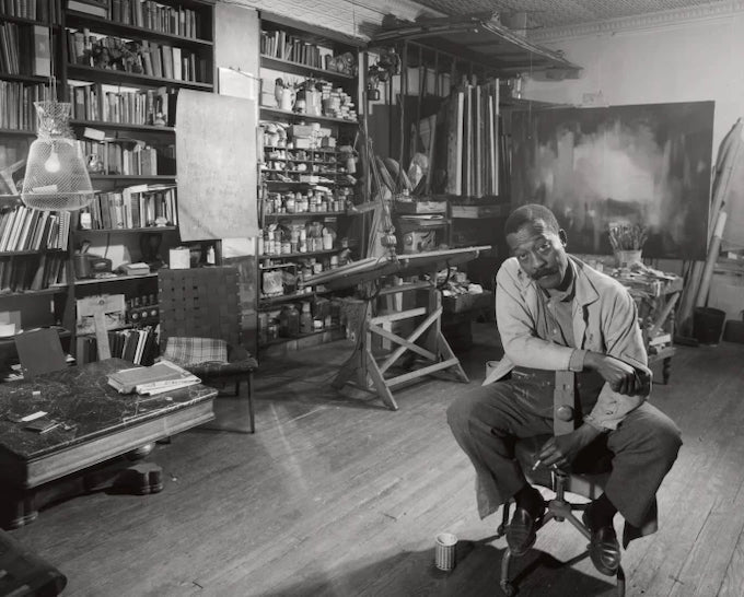 Abstract artist Norman Lewis in his Harlem studio in New York, February 1960. Photo: Arnold Newman / Arnold Newman Collection via Getty.